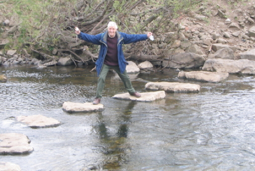 Guy on stepping stones